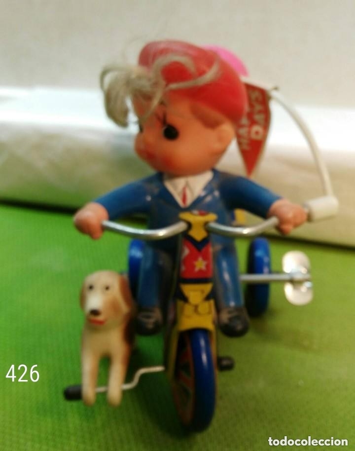 Juguetes antiguos de hojalata: Ni&ntilde;o en moto - Foto 1
