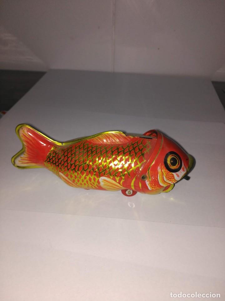 Juguetes antiguos de hojalata: Peces de hojalata.. - Foto 1