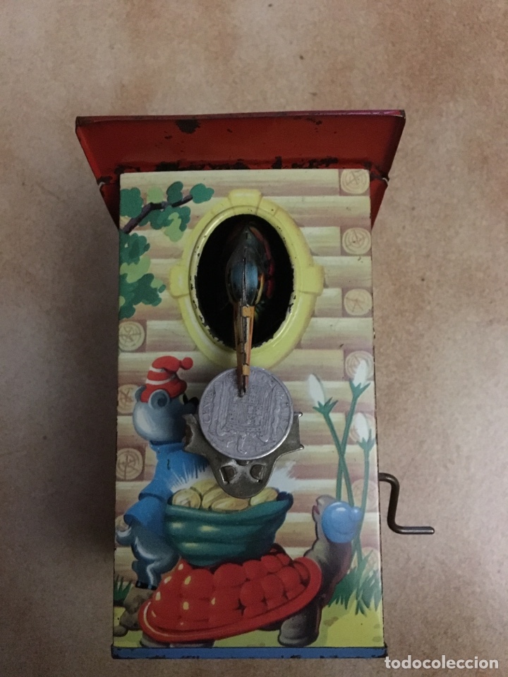 Juguetes antiguos de hojalata: Hucha p&aacute;jaro hojalata - Foto 1