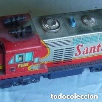 Juguetes antiguos de hojalata: LOCOMOTORA TRADE MARK - Foto 2