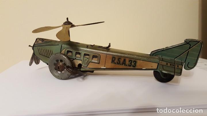 Juguetes antiguos de hojalata: Autogiro antiguo a cuerda - Foto 2