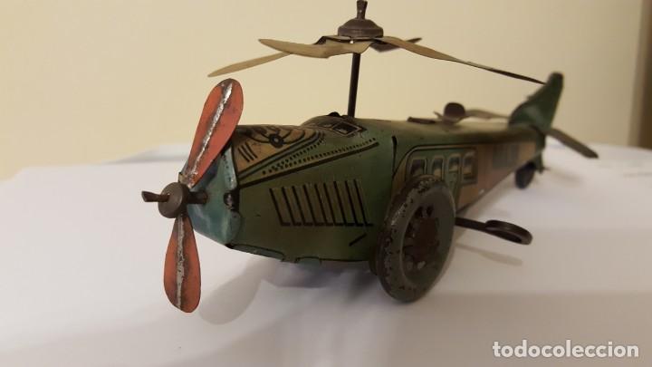 Juguetes antiguos de hojalata: Autogiro antiguo a cuerda - Foto 3