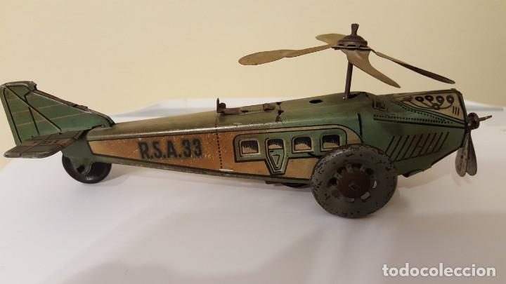Juguetes antiguos de hojalata: Autogiro antiguo a cuerda - Foto 6