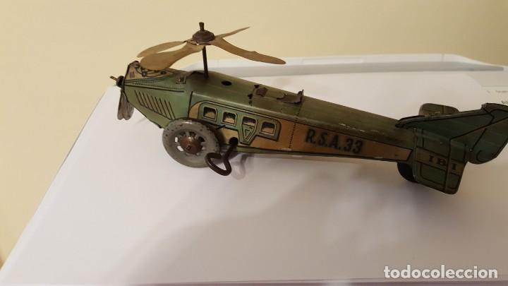 Juguetes antiguos de hojalata: Autogiro antiguo a cuerda - Foto 13