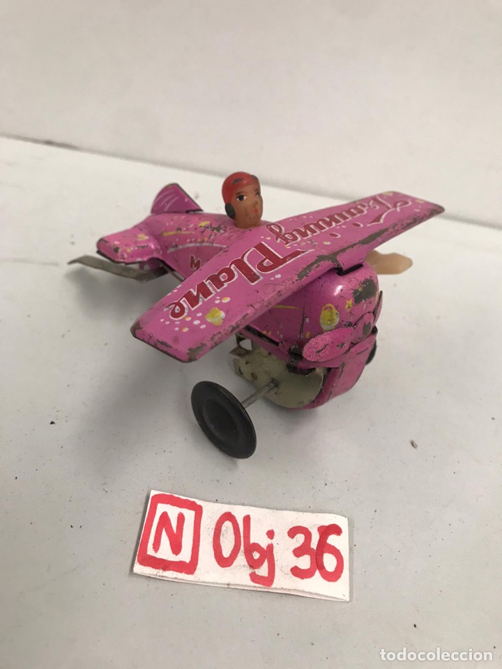 Juguetes antiguos de hojalata: avion hojalata training plane funciona a cuerda - Foto 1