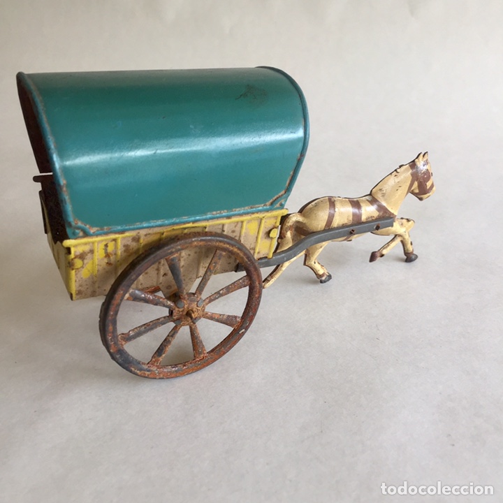 Juguetes antiguos de hojalata: Carruaje con caballo Rico. - Foto 2