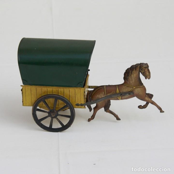 Juguetes antiguos de hojalata: Carruaje con caballo Rico. - Foto 1