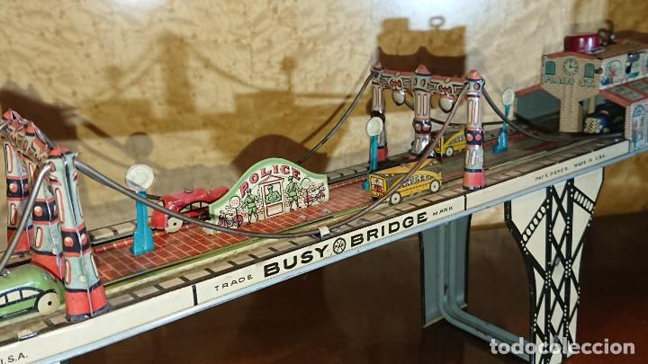Juguetes antiguos de hojalata: Busy bridge Louis Marx - Foto 1