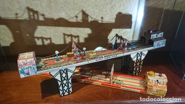 Juguetes antiguos de hojalata: Busy bridge Louis Marx - Foto 5