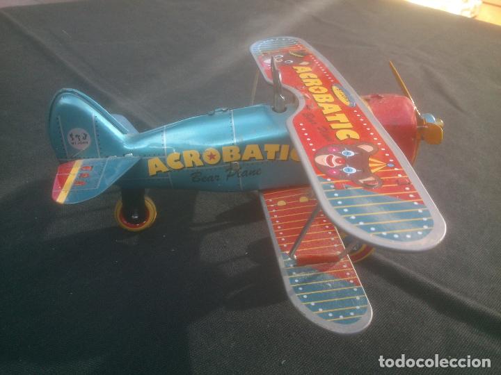 Juguetes antiguos de hojalata: HOJALATA CHAPA ACROBATIC BEAR PLANE - Foto 4