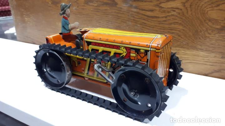 Juguetes antiguos de hojalata: Tractor americano - Foto 1