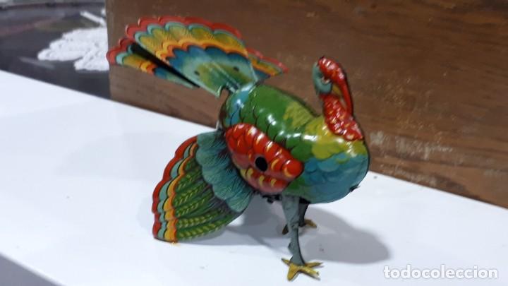Juguetes antiguos de hojalata: Pavo Real - Foto 1