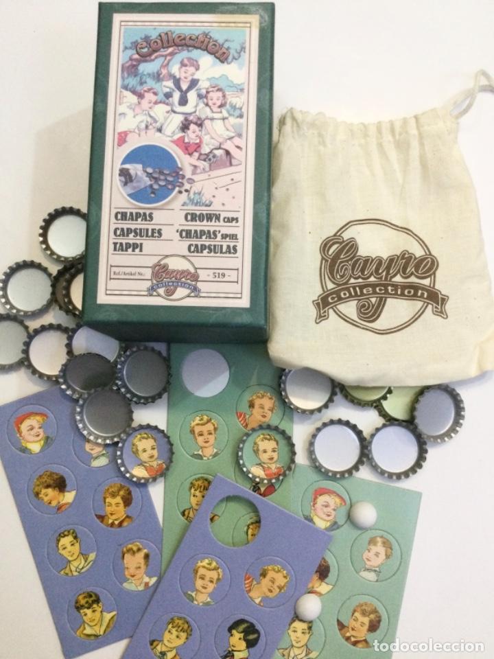 Juguetes antiguos de hojalata: Juego de Chapas. CAYRO. NUEVO - Foto 1