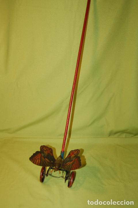 Juguetes antiguos de hojalata: mariposa de rico con palo - Foto 7 - 296702158