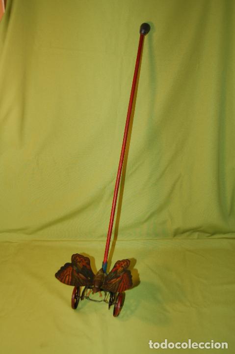 Juguetes antiguos de hojalata: mariposa de rico con palo - Foto 9 - 296702158