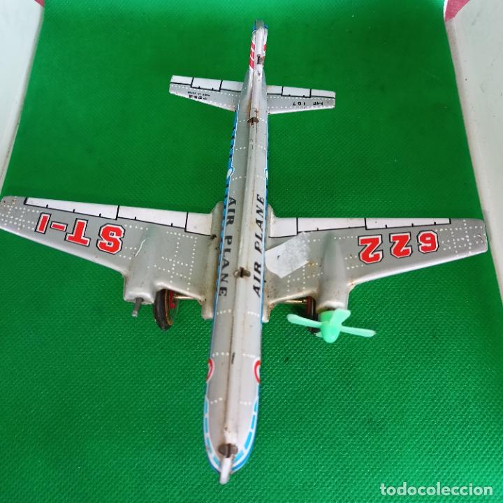 Juguetes antiguos de hojalata: Avi&oacute;n hojalata - Foto 2
