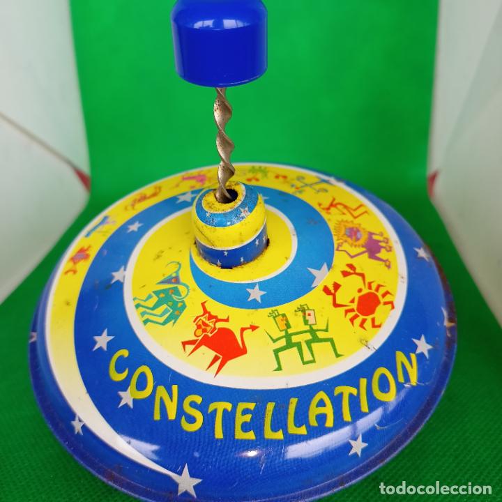 Juguetes antiguos de hojalata: Peonza constellation hojalata - Foto 1