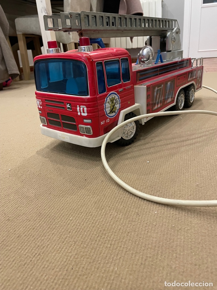 Juguetes antiguos de hojalata: Pegaso bomberos paya - Foto 1