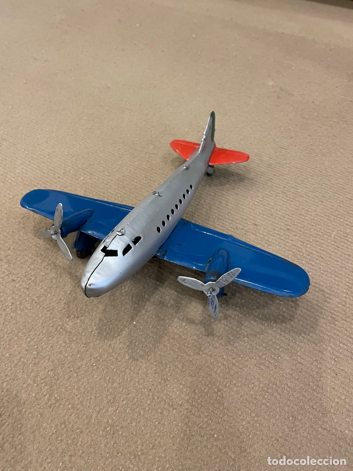 Juguetes antiguos de hojalata: Avi&oacute;n hojalata - Foto 1