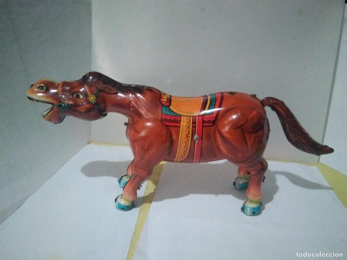 Juguetes antiguos de hojalata: Antiguo caballo de hojalata 26 cm ) - Foto 1
