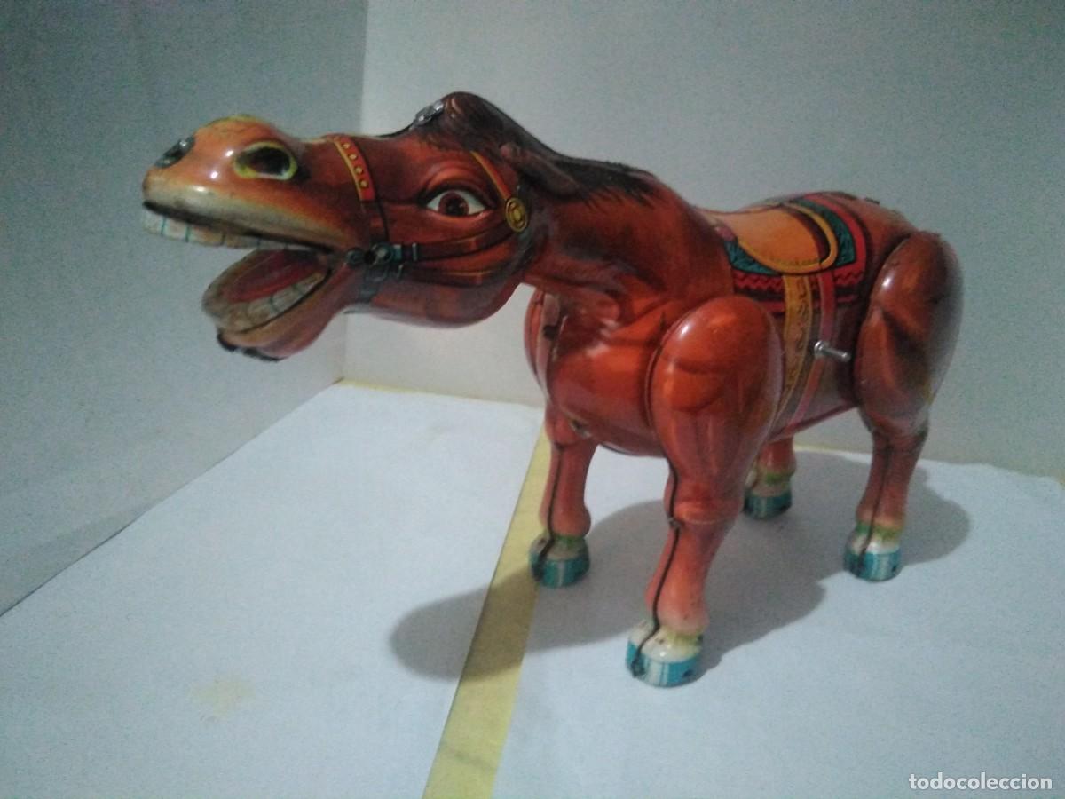 Juguetes antiguos de hojalata: Antiguo caballo de hojalata 26 cm ) - Foto 6