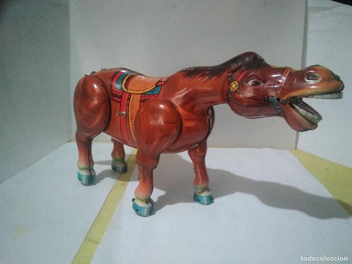 Juguetes antiguos de hojalata: Antiguo caballo de hojalata 26 cm ) - Foto 7