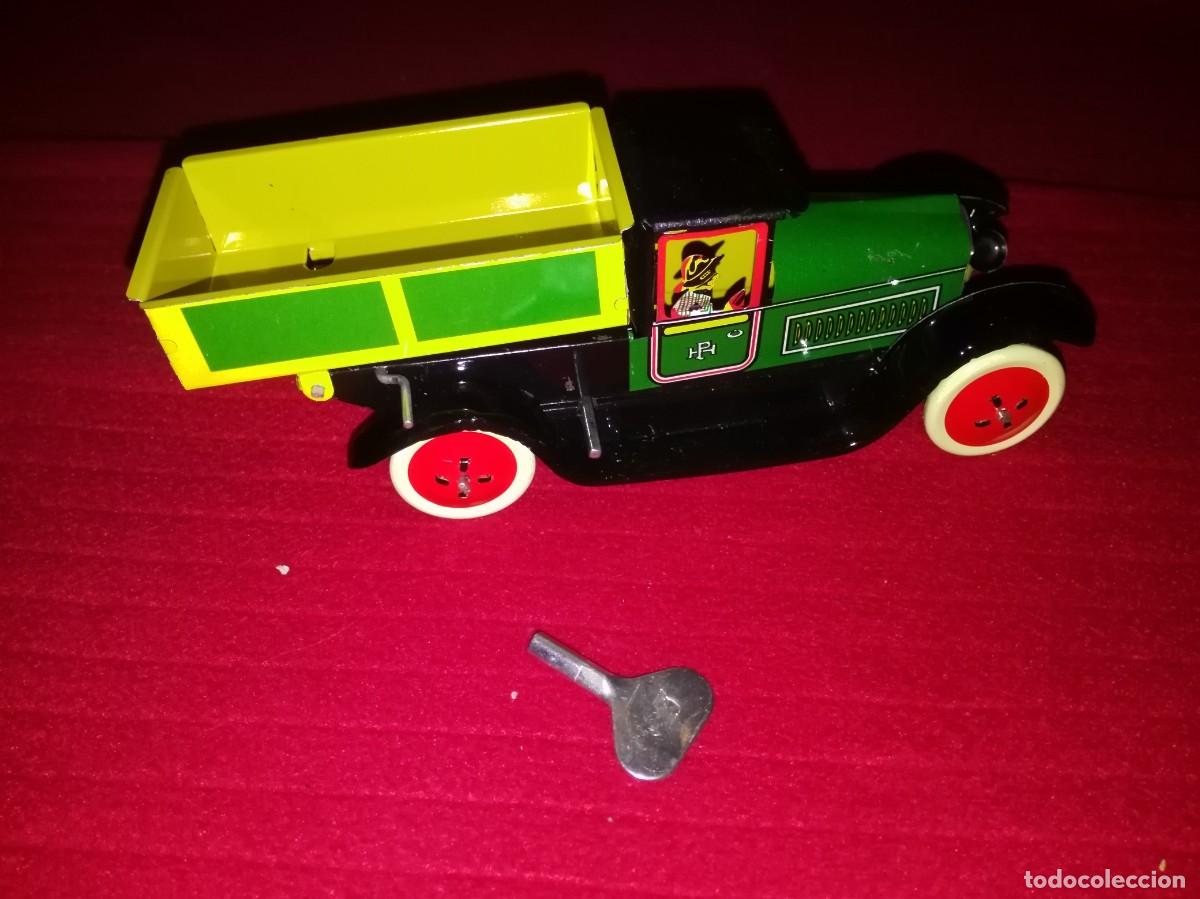 Juguetes antiguos de hojalata: CAMI&Oacute;N VOLQUETE - Foto 3