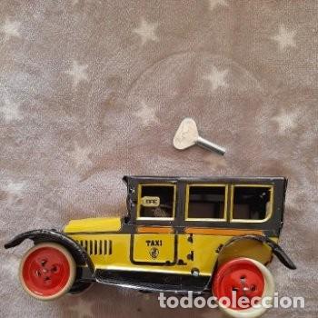 Juguetes antiguos de hojalata: TAXI - Foto 1