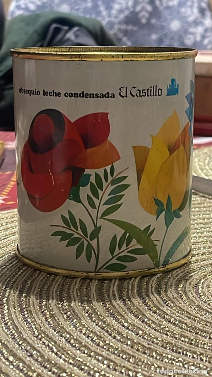 Juguetes antiguos de hojalata: HUCHA LECHE CONDENSADA EL CASTILLO FLORES - Foto 1