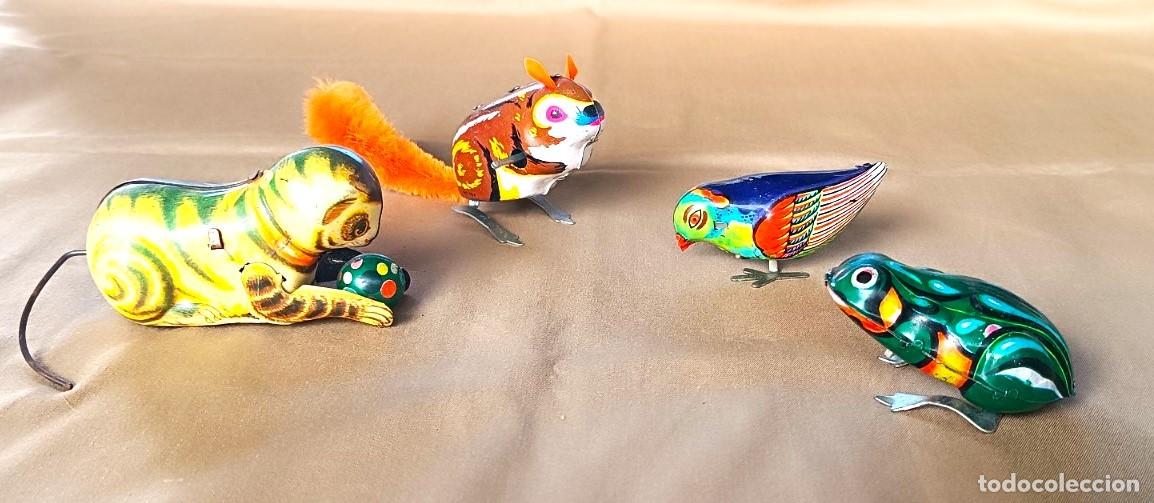Juguetes antiguos de hojalata: CUATRO ANIMALITOS MEC&Aacute;NICOS. - Foto 1