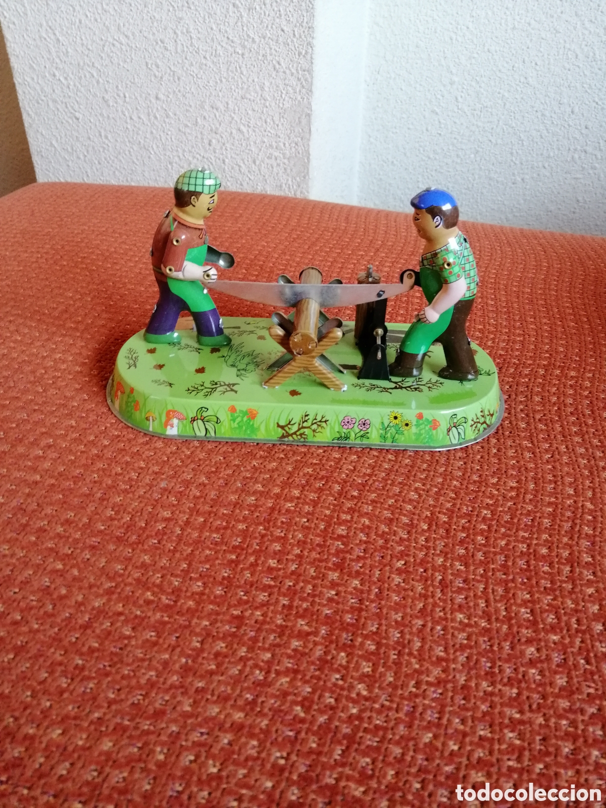 Juguetes antiguos de hojalata: SERRADOR DE TRONCOS - Foto 1