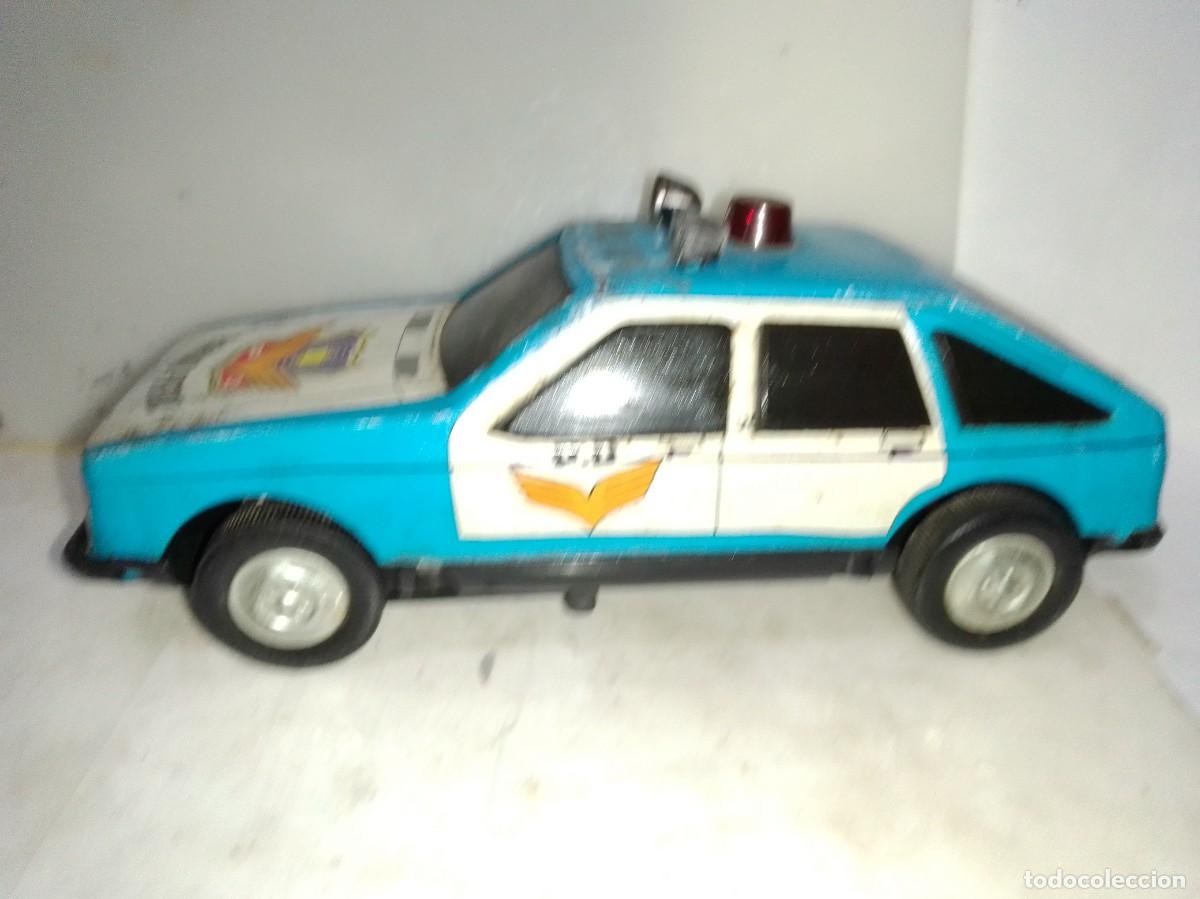 Juguetes antiguos de hojalata: Coche de policia funcinando - Foto 1