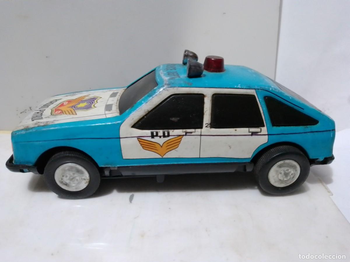 Juguetes antiguos de hojalata: Coche de policia funcinando - Foto 2