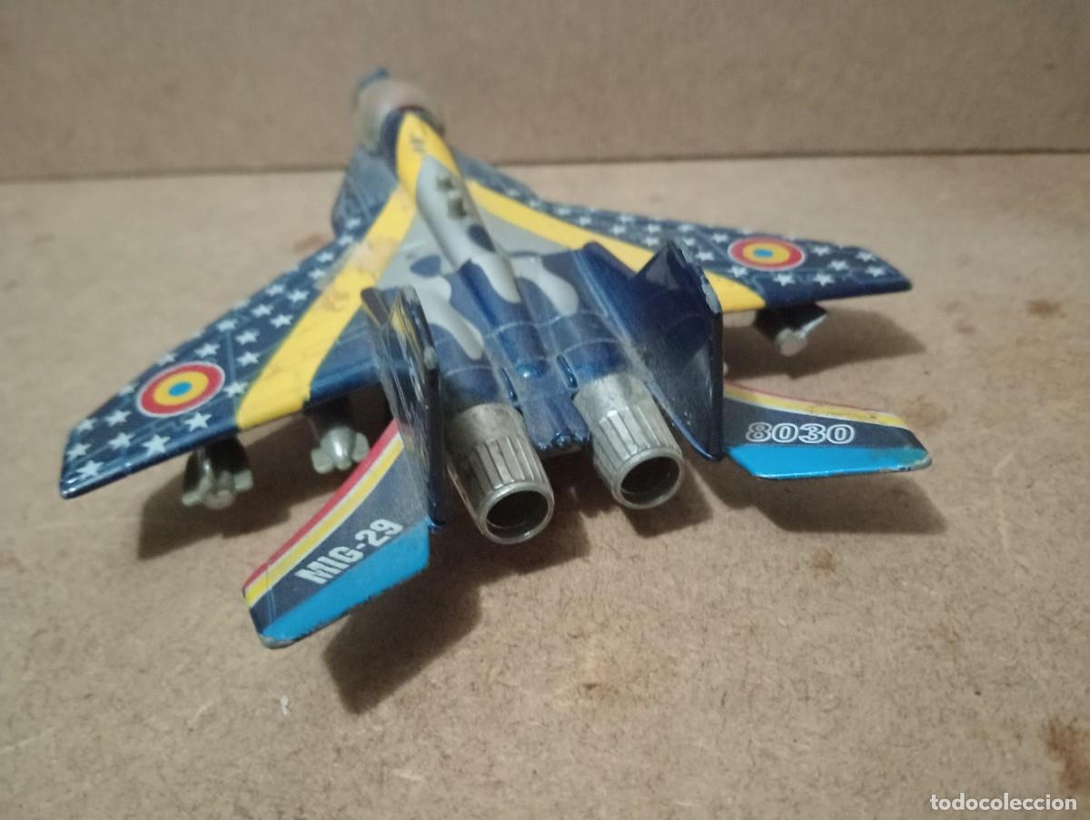 Juguetes antiguos de hojalata: Avion de combate metalico - Foto 4