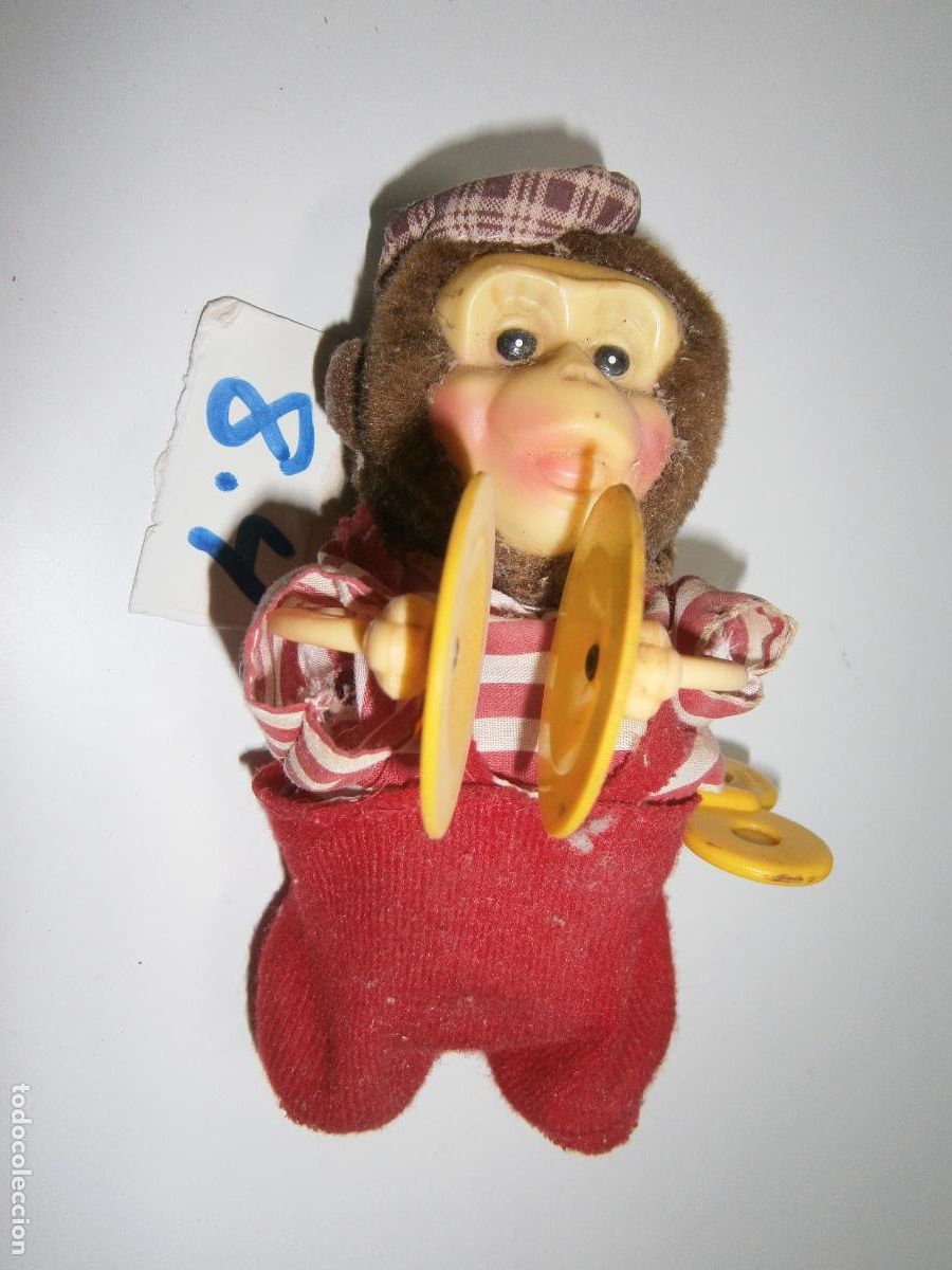 Juguetes antiguos de hojalata: MONO TOCANDO LOS PLATILLOS - Foto 1
