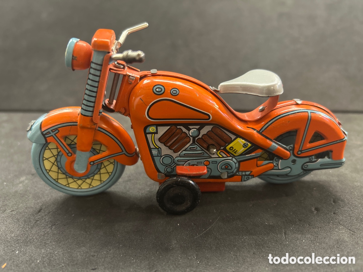 Juguetes antiguos de hojalata: Moto de hojalata a cuerda - Foto 1