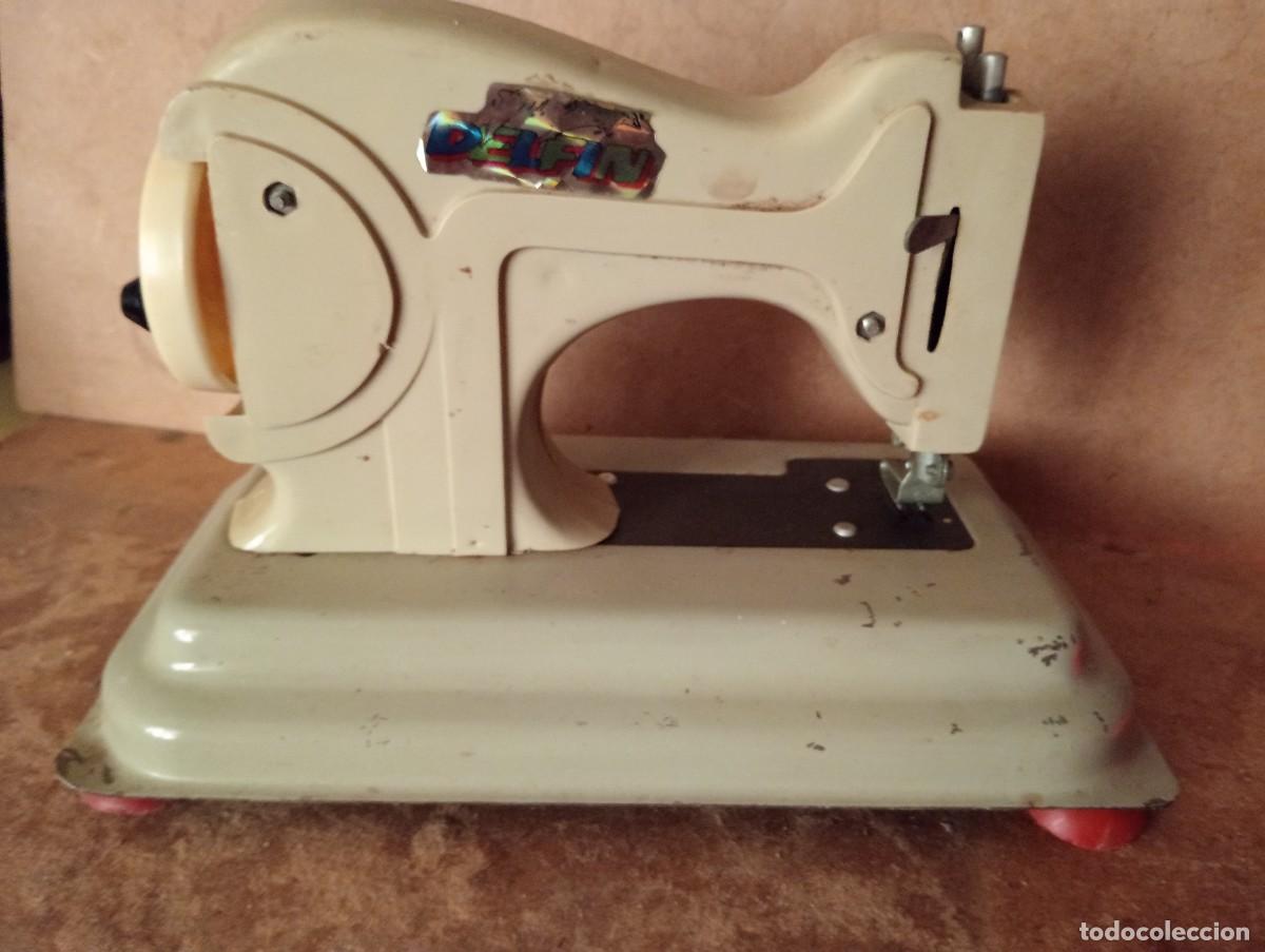 Juguetes antiguos de hojalata: Antigua maquina de coser EUREKA - Foto 2
