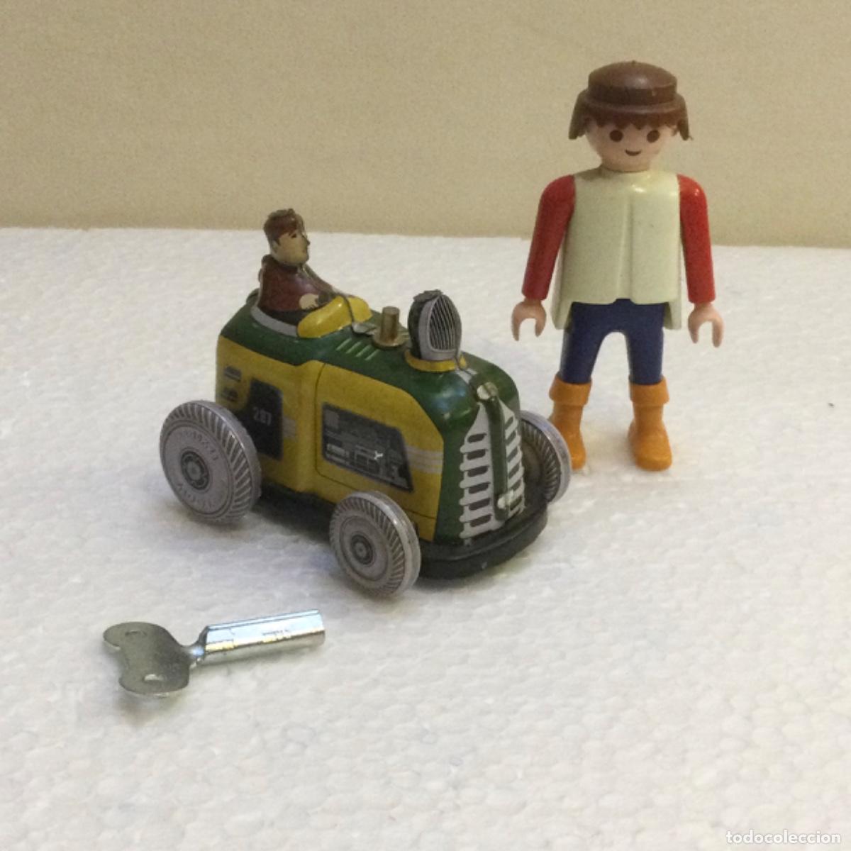 Juguetes antiguos de hojalata: Mini tractor en hojalata a cuerda. NUEVO - Foto 1