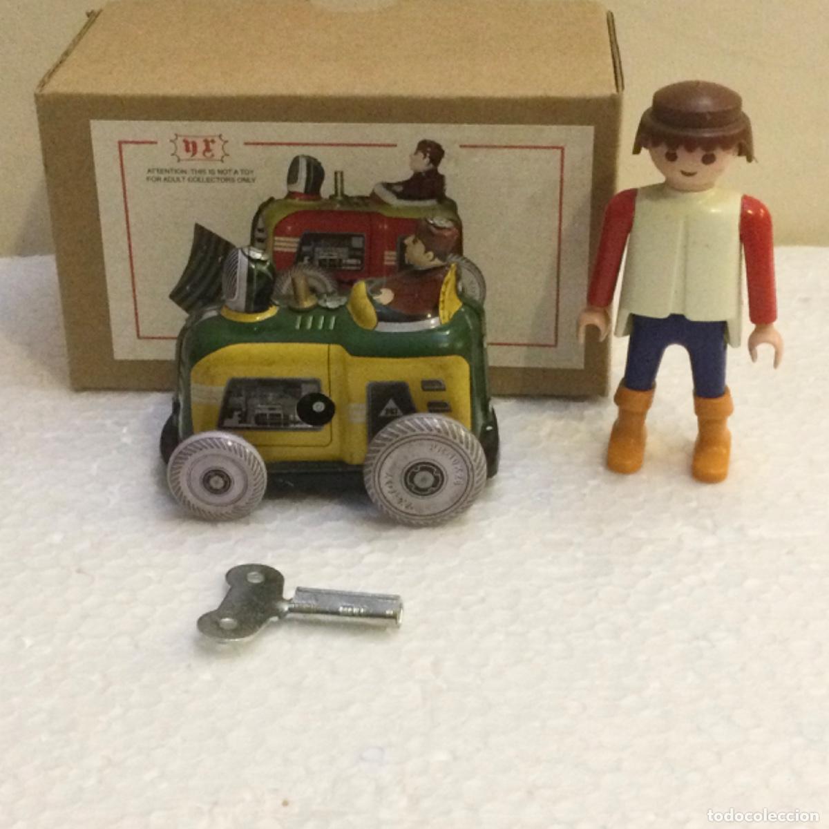 Juguetes antiguos de hojalata: Mini tractor en hojalata a cuerda. NUEVO - Foto 3