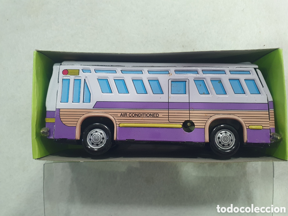 Juguetes antiguos de hojalata: Autobus de lata a cuerda. (L62)