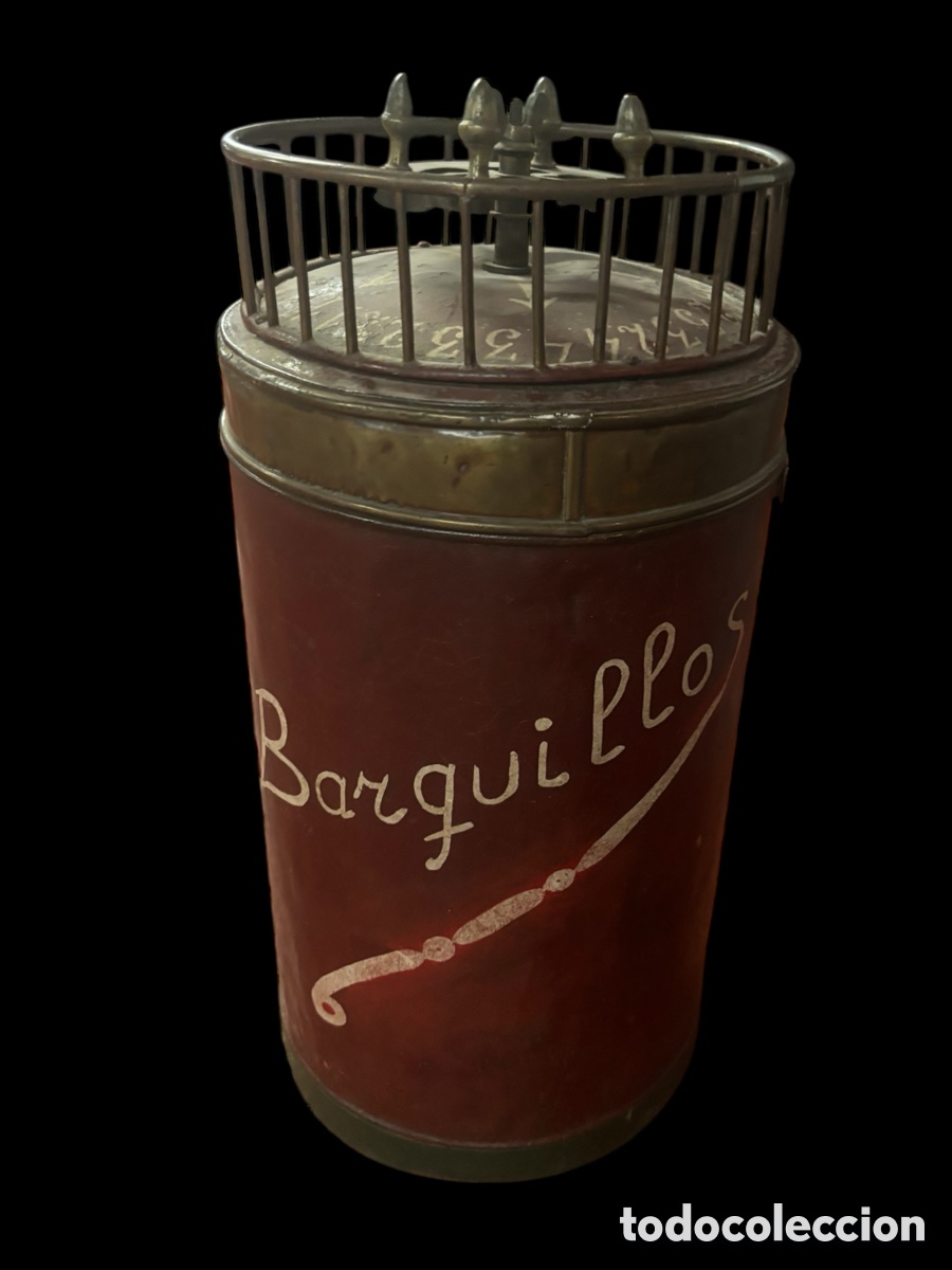 Juguetes antiguos de hojalata: Ruleta de barquillos.