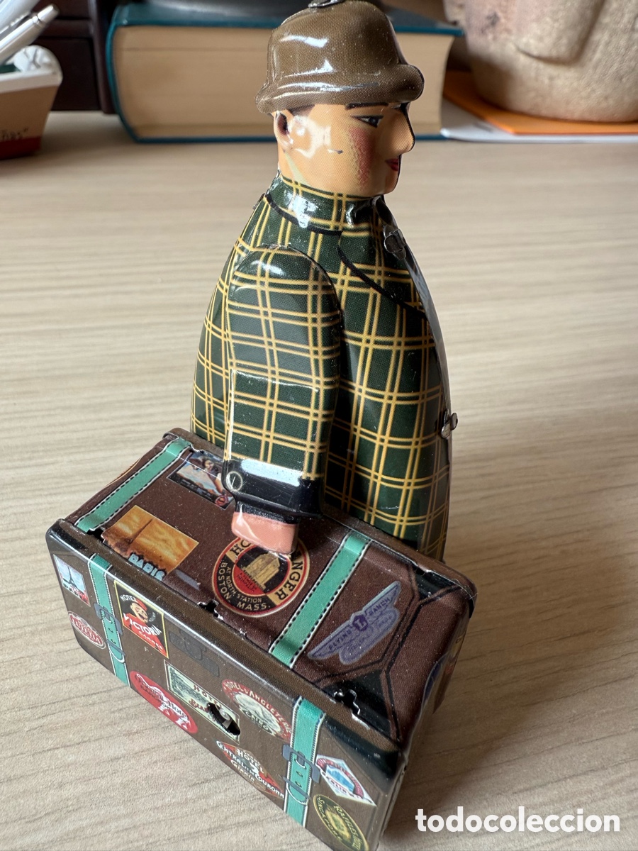 Juguetes antiguos de hojalata: Aut&oacute;mata de hojalata . El Maletero .