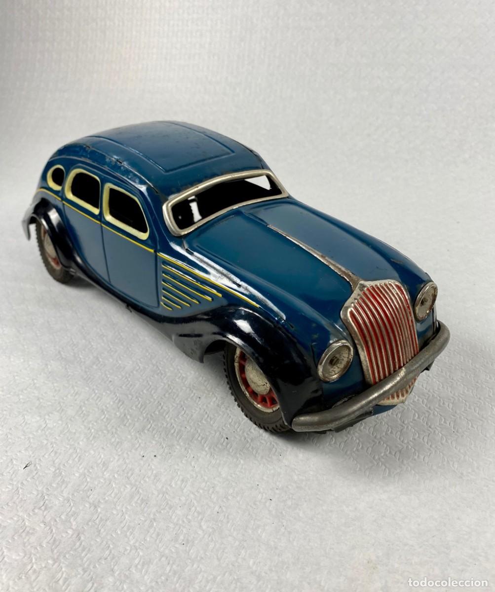 Juguetes antiguos de hojalata: Coche de hojalata a&ntilde;os 50 Original con mecanismo de cuerda manufactura espa&ntilde;ola