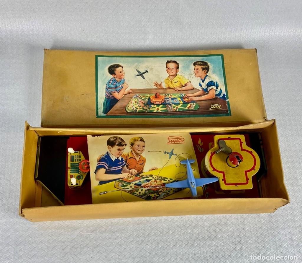 Juguetes antiguos de hojalata: Antiguo juego Aeroclub de Pay&aacute; a cuerda en su caja y en perfecto estado a&ntilde;os 50 Original