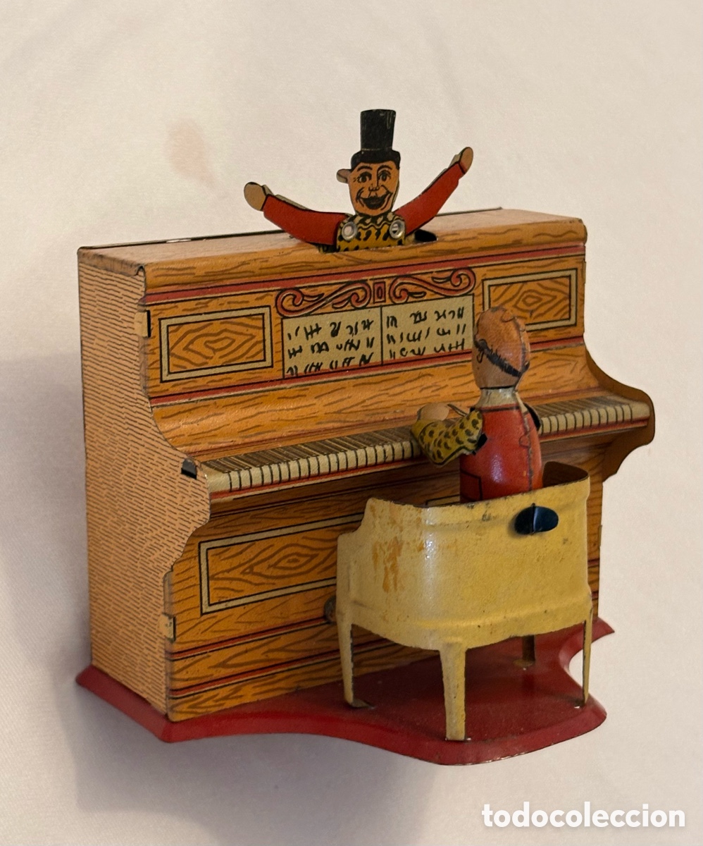 Juguetes antiguos de hojalata: Piano con director de PAYA
