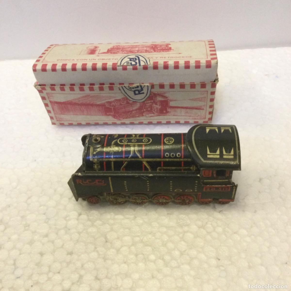 Juguetes antiguos de hojalata: Locomotora en hojalata de Rico con caja. A&ntilde;os 50/60