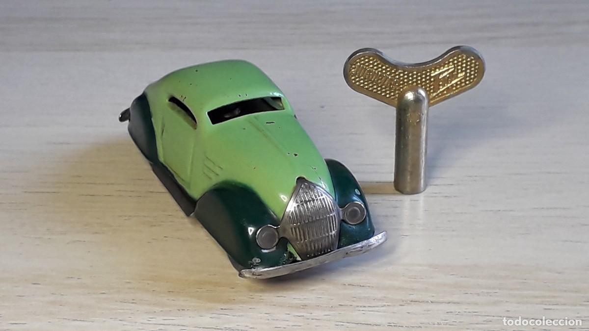 Juguetes antiguos de hojalata: Coche Auto Pulga, 6,5 cms, hojalata, mecanismo a cuerda, Paya Rai Ibi Spain, original a&ntilde;os 40-50.
