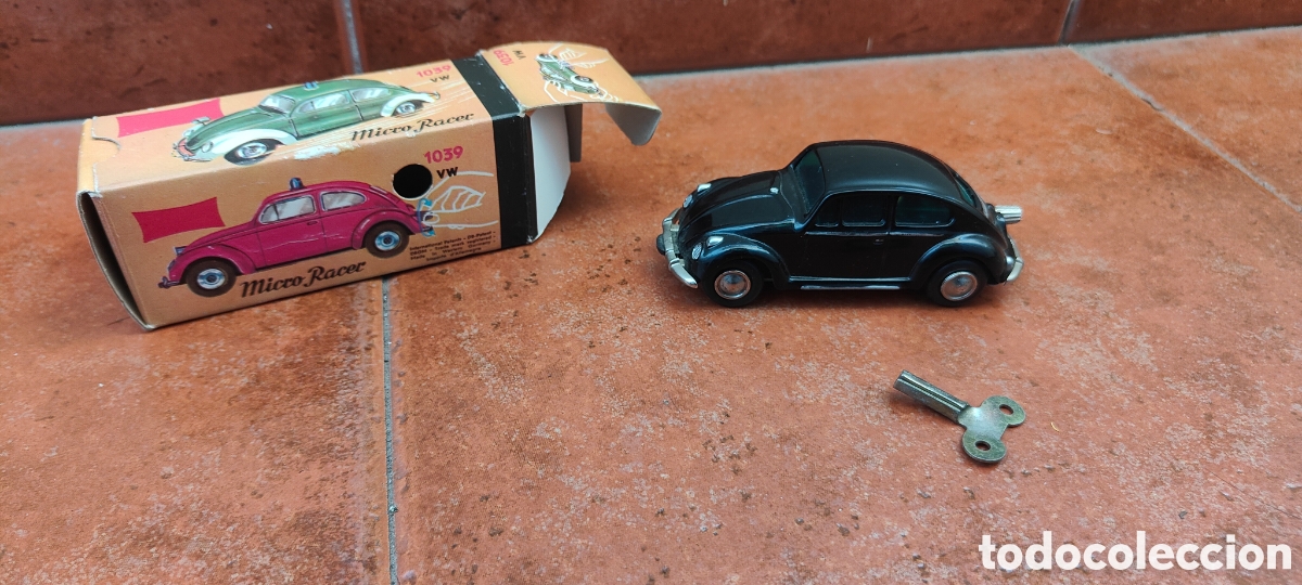 Juguetes antiguos de hojalata: VOLKSWAGEN ESCARABAJO A CUERDA ALEMAN
