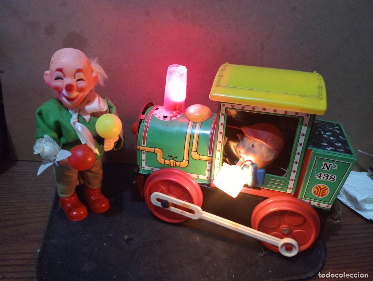 Juguetes antiguos de hojalata: Dos juguetes de hojalata para reparar o coleccionar