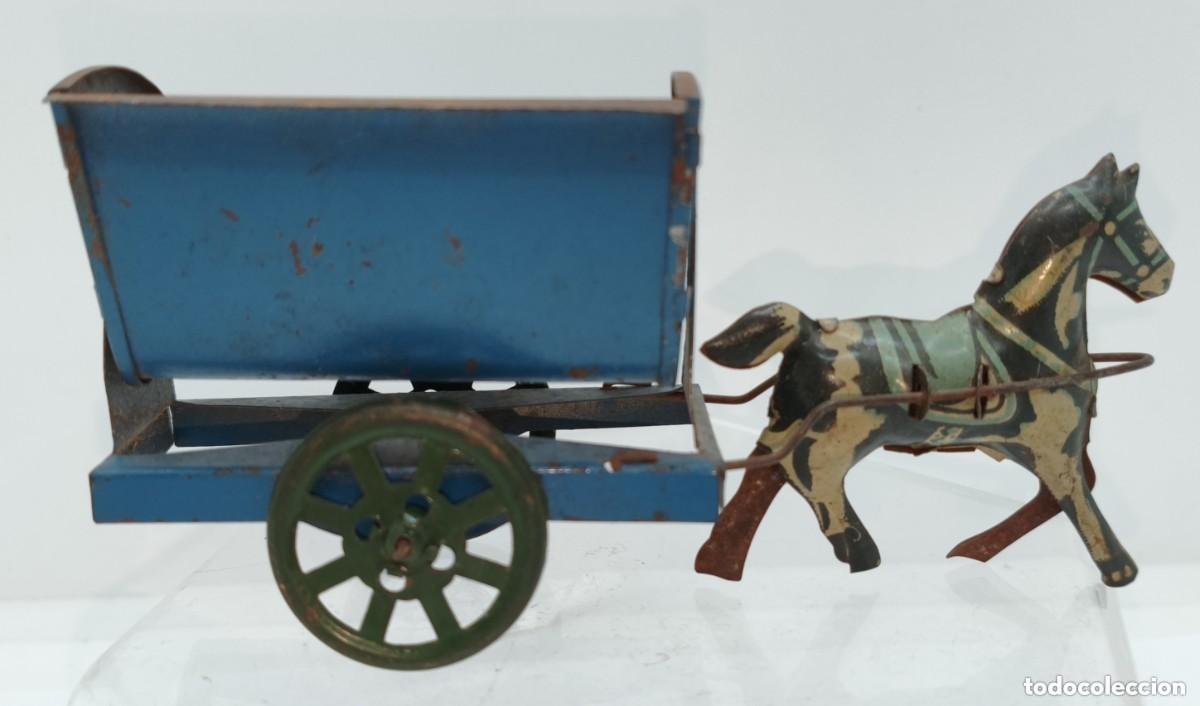 Juguetes antiguos de hojalata: Antiguo juguete de hojalata. &iquest;Pay&aacute; / Rico? Peque&ntilde;o carro basura o minero.